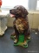 BROWN RETRIEVER DOG GARDEN STATUE; DEPICTS A BROWN RETRIEVER IN THE SITTING POSITION. IS MADE OF