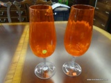 TALL ORANGE GLASS STEMMED VASES; TOTAL OF 2 PIECES, WITH GENTLY FLUTED SIDES, AND JUST A FEW SLIGHT