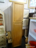 WOODEN CABINET UNIT; TWO DOOR LIGHT COLORED WOOD GRAIN CABINET UNIT WITH METAL HARDWARE. TOP CABINET