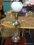 VINTAGE TALL BRASS TABLE LAMP WITH ROUND WHITE GLOBE ON TOP; HAS A URN CENTER SEGMENT, TURNED POST,