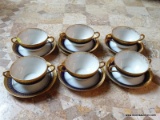 LIMOGES TEACUP AND SAUCER SET; TOTAL OF 6 DOUBLE HANDLED CUPS AND SAUCERS, ALL MARKED WM GUERIN & CO
