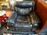 BLACK LEATHER ELECTRIC RECLINER; PILLOW BACK DESIGN WITH DURABLE WHITE STITCHING, PILLOWED ARMS, AND