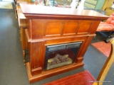 TWIN STAR ELECTRIC FIREPLACE; MODEL #23EF003GAA, CHERRY WOOD FRAMED MANTEL WITH BLACK AND GLASS