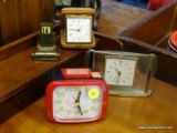 CLOCK LOT; INCLUDES 4 CLOCKS TOTAL. 1 IS A WESTCLOX, 1 IS A TRAVEL CLOCK, 1 IS A QUARTZ AND 1 IS A