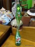 STRETCHED 7-UP BOTTLE; VINTAGE SUGAR FREE 7-UP BOTTLE THAT HAS BEEN STRETCHED INTO A WORK OF ART!