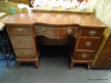 VINTAGE MAHOGANY DOUBLE PEDESTAL DESK; BOWED CENTER WITH MIDDLE DRAWER, AS WELL AS LEFT AND RIGHT
