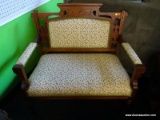 VICTORIAN SETTEE; WALNUT VICTORIAN SETTEE WITH CARVED AND REEDED SIDES, BURL WALNUT INLAY CREST,