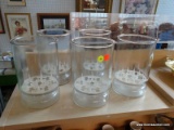 (B1A) FLORISTS VASES; TOTAL OF 5. ALL ARE CLEAR IN COLOR AND HAVE DOUBLE SIDED FOAM HOLDERS. MEASURE