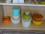 (B1A) TUPPERWARE LOT; INCLUDES AN OBLONG SERVING CONTAINER, GREEN BOWLS, TRANSLUCENT WHITE