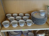 (B1A) LUNCHEON SET; INCLUDES 12 LUNCHEON PLATES AND 12 CUPS. ALL ARE WHITE WITH A BLUE FLORAL