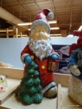 (B1A) PLASTER SANTA; IS RED, GREEN, WHITE, AND BLUE IN COLOR. MEASURES 24 IN TALL