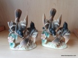 (B1B) PAIR OF BIRD FIGURINES; MADE BY NASCO. EACH IS BROWN AND GREEN IN COLOR. 1 HAS A MINOR CHIP TO