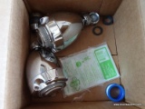 (TBL) SHOWER HEADS; PAIR OF WARM WISE SHOWER FAUCET HEADS IN THE ORIGINAL BOX WITH PAPERWORK.