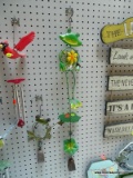 (BACK) FROG DECOR LOT; INCLUDES 2 WALL HANGING FROG DECORATIONS WITH BELLS HANGING FROM THE BOTTOM.