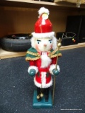 (FL) HOLIDAY NUTCRACKER; IN THE FORM OF SAINT NICHOLAS WITH STAFF. MEASURES 15 IN TALL. IS IN GOOD