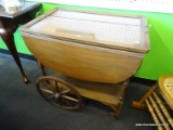 VINTAGE WOODEN TEA CART; HAS REMOVABLE HANDLED GLASS BUTLERS TRAY ON TOP. EACH SIDE HAS A SCALLOPED