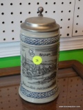 VINTAGE GERMAN BEER STEIN; MADE BY WICK-WERKE AND IS BLUE AND GRAY IN COLOR WITH AN IMAGE OF THE