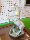 1962 JIM BEAM HORSE SHAPED LIQUOR BOTTLE; WHITE AND GREY TO GREYISH GREEN IN COLOR, MEASURES 13.5 IN