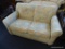 ETHAN ALLEN LOVESEAT; 2 CUSHION LOVESEAT WITH FLORAL UPHOLSTERY AND ROLLED ARMS. IS IN EXCELLENT