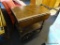 ROLLING TEA CART; PINE TEA CART WITH DROP SIDES, LOWER SHELF, AND FIXED HANDLE. IS IN VERY GOOD