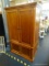 ENTERTAINMENT ARMOIRE; CHERRY ENTERTAINMENT ARMOIRE WITH INNER TV SHELF WITH STORAGE UNDERNEATH FOR