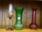 3 PIECE LOT; INCLUDES A GREEN HOOSIER GLASS VASE, A RED E.O. BRODY GLASS VASE, AND AN AMETHYST