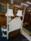 TWIN SIZED BED; WHITE PAINTED 4 POSTER BED WITH BEADED CENTER HEADBOARD AND SCREW ON FINIALS. IS IN