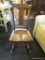 VINTAGE ROCKING CHAIR; VINTAGE OAK CHAIR WITH A STRAIGHT BACK AND PLANK BOTTOM SEAT. MEASURES 15 IN
