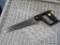 COMPASS SAW; HAND SAW WITH BLACK HANDLE AND PHILLIPS HEAD SCREWS HOLDING THE BLADE.