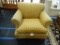 WILLIAM ALAN OVERSTUFFED CHAIR; HAS A BROWN AND GOLD TONED ALTERNATING DIAMOND PATTERN AND HAS