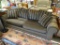 GRAMERCY HILL 2 CUSHION SOFA; IS BROWN IN COLOR WITH ROLLED ARMS AND BROWN AND BLACK STRIPED