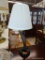 LEGGING LAMP; IN THE FORM OF A LADIES LEG WITH LACED STOCKING AND A HIGH HEEL SHOE. HAS SHADE AND