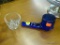 LOT OF SMALL GLASSWARE; THIS 2 PIECE LOT CONTAINS A SMALL, CLEAR GLASS MORTAR AND PESTLE, AS WELL AS