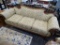 VINTAGE WOOD, BEIGE, AND GREY TRIVETTE SOFA; VINTAGE, WOOD FRAMED TRIVETTE SOFA WITH ROLLED ARMS, A