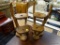 PAIR OF MULTI-TIERED WOODEN CANDLE STANDS; PAIR OF WOODEN CANDLE STANDS THAT APPEAR TO MIMIC DEER