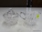 CUT GLASS SUGAR AND CREAMER; HATCHED CUT HANDLED CREAMER WITH MATCHING SUGAR BOWL WITHOUT LID.