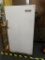 HOLIDAY UPRIGHT FREEZER; WHITE HOLIDAY FREEZER WITH WOOD PANEL HANDLE. CONTAINS 3 METAL WIRE SHELVES