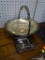 LOT OF SILVERPLATE; THIS 2 PIECE LOT INCLUDES A STEMMED, OVAL BASKET WITH GRAPE VINE DESIGNS ON