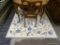 BLUE AND YELLOW FLORAL AREA RUNNER; FEATURES LIGHT BLUE, DARK BLUE, AND YELLOW FLOWERS ON A VINE,