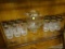 LEMONADE SET; 13 PIECE SET, INCLUDING 12 GLASSES AND A PITCHER. GLASSES HAVE ETCHED DESIGNS, AND
