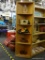 WOODEN CORNER SHELVING UNIT; STURDY LIGHT COLORED WOOD GRAIN CORNER UNIT WITH 4 SHELVES. THE 2
