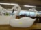 SWAN SCULPTURE; CRAFTED FROM WOOD. HAS A FEW CRACKS WHERE IT APPEARS TO HAVE BEEN REPAIRED. MEASURES