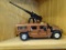 MODEL HUMMER; INCLUDES A 1/18 SCALE HUMMER (1 WHEEL NEEDS TLC). IS COPPER TONED AND WOULD BE GREAT