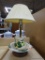 VINTAGE CERAMIC TABLE LAMP; CREAM COLORED PLEATED BELL SHAPED SHADE SITTING ON A HAND PAINTED BODY
