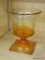 VINTAGE GLASS PEDESTAL DISH; PEACH COLORED PRESSED GLASS FLUTED PEDESTAL DISH. STAMPED 