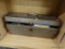 VINTAGE METAL TOOLBOX AND CONTENTS; GREY METAL TOOL BOX WITH HANDLE AND LATCH. INSIDE THERE IS A