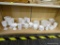 SHELF LOT OF MILK GLASS DINNERWARE; 37 PIECE LOT TO INCLUDE 7 PLATES, 8 SAUCERS, 8 TEA CUPS, 7