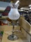 SILVER PLATE TABLE LAMP; HAS A FROSTED GLASS GLOBE AND MEASURES 17 IN TALL