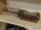 PARTIAL SHELF LOT OF WOODEN SERVING TRAYS; THIS 2 PIECE LOT INCLUDES A DOUBLE HANDLED DARK WOOD