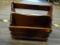 MAGAZINE HOLDER; PINE 2 SECTION MAGAZINE HOLDER WITH SLATTED BACK AND FRONT. MEASURES 17 IN X 8 IN X